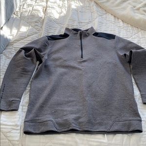 Men's grey Under Armour golf quarter zip